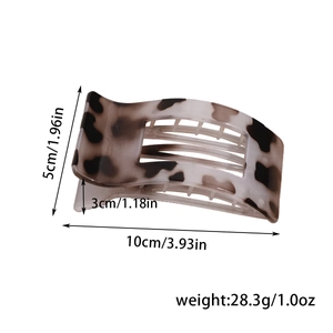 Detailed view of leopard print hair claw clip showing dimensions 10cm and weight 28.3g