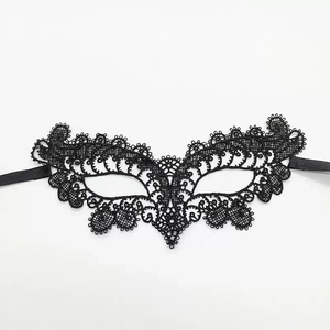 Elegant black lace fox masquerade mask with intricate floral patterns and ribbon ties