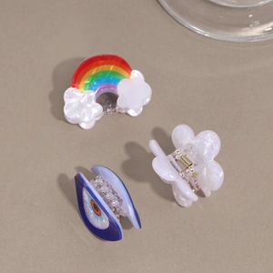 Lot de 3 pinces à cheveux avec motifs arc-en-ciel, fleurs et œil protecteur bleu