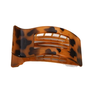 Polished leopard print hair claw clip in tortoiseshell finish for thick hair