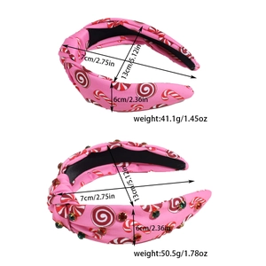 Detail view of pink knot headband with candy print and sparkling rhinestone accents