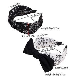 Detail view of floral headbands with dimensions 12cm and 16cm in black and white fabric