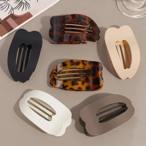 Set of six large organic shell hair claws in classic tortoise and neutral colors