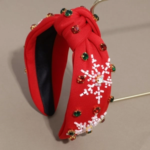 Red knotted headband with colorful rhinestones and white bead snowflake embroidery