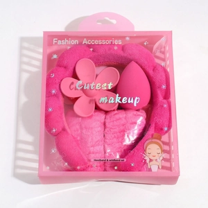 Pink plush headband and wristband set in a gift box for facial cleansing and makeup