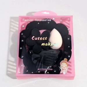 Beauty accessory gift set featuring plush headband and hair clips in pink window box