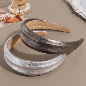 Chic padded snake print headbands in silver and bronze leather for a retro stylish look