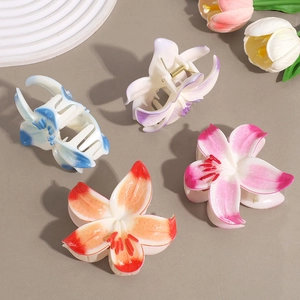 Elegant lily flower hair claw clips set in four gradient colors for stylish hair styling
