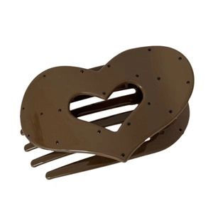 Chic oval heart-shaped hair claw clip in brown with black polka dots and hollow design