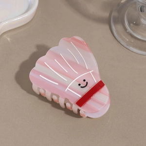 Pink and white striped badminton shaped hair claw clip with a minimalist smiley face design