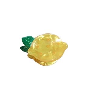 Pince à cheveux citron mignonne avec texture marbrée jaune et design de feuilles