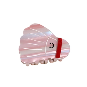Pink and white striped badminton shuttlecock hair claw clip with a cute smiley face design