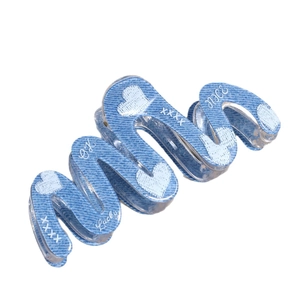Blue denim texture hair claw clip with white heart prints and wave-shaped design