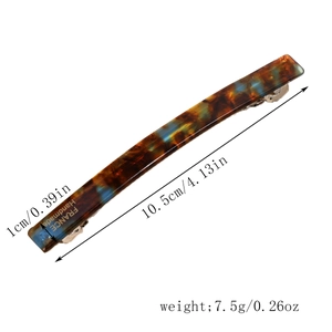 Detailed size view of tortoiseshell acetate hair clip measuring 10.5cm by 1cm