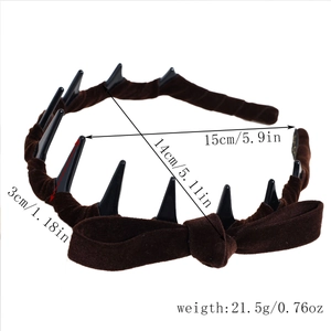 Detailed view of brown velvet headband with size dimensions and spiked tooth design