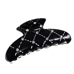 Pince à cheveux noire élégante avec motif matelassé blanc et strass en cristal étincelants