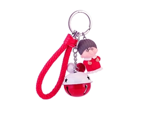 Mignon porte-clés grand-mère avec corde tressée rouge et clochette étoilée sur fond blanc