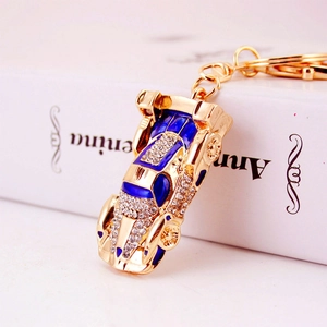 Creative rhinestone car model keychain with blue enamel finish and golden metal link