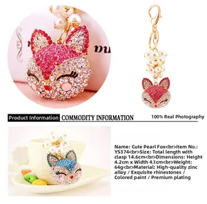 Detailed view of fox keychain with faux pearls and rhinestones measuring 14.6cm