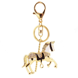 Porte-clés cheval de manège étincelant en alliage doré avec strass et détails émail