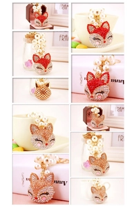 Detail of fox head keychain with rhinestones and faux pearl chain in lifestyle settings