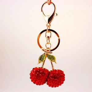 Sparkling cherry rhinestone keychain with red crystals and gold-plated lobster clasp accessory