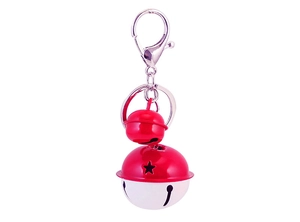 Dettaglio portachiavi campanelli metallo rosso bianco con intagli a stella e moschettone
