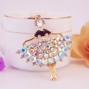Elegant gold ballerina keychain with colorful rhinestones and black enamel finish