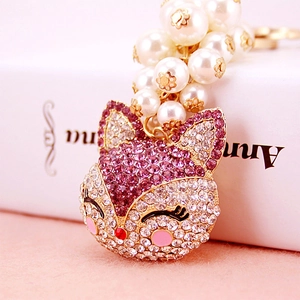 Sparkling fox head keychain with pink rhinestones and elegant faux pearl charms