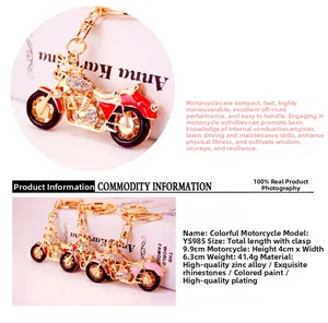 Detailed size view of motorcycle keychain with rhinestones and carabiner clip