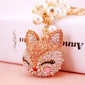 Elegant fox head keychain with champagne rhinestones and white imitation pearls