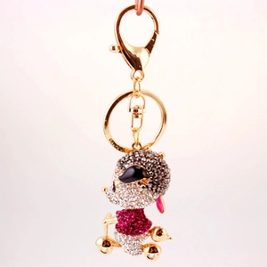 Cartoon mouse riding scooter keychain with pink and white crystal rhinestones