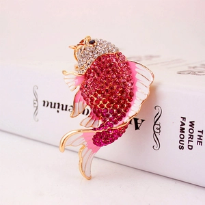 Creative koi fish keychain with red rhinestones and pink enamel on a gold metal base