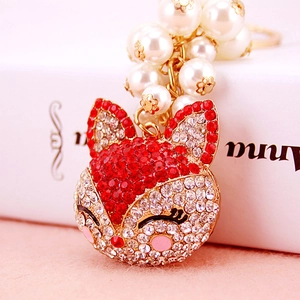 Sparkling fox keychain with red and white crystals and elegant faux pearl charms