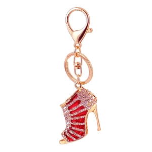 Red high heel keychain with purple rhinestones on a gold lobster clasp and ring