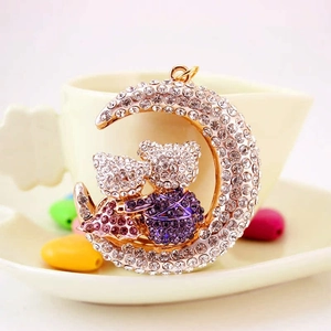 Sparkling crystal moon and bears keychain pendant with purple rhinestones on gold alloy