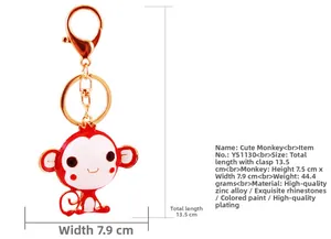 Detail view of cartoon monkey keychain dimensions showing 13.5cm length with rhinestones