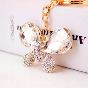 Porte-clés papillon doré avec cristaux brillants pour accessoire de sac à main de femme