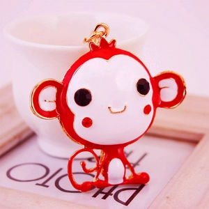 Creative red cartoon monkey keychain with crystal eyes and gold metal hook accessory