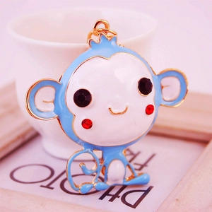 Cute blue monkey keychain charm with enamel finish and sparkling crystal eyes decoration