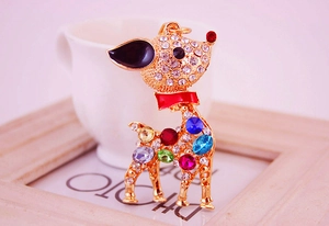 Macro view of crystal deer keychain with colorful rhinestones and gold plating finish