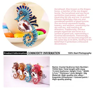 Macro shot of rhinestone-studded seahorse keychain with heart crystal and size details