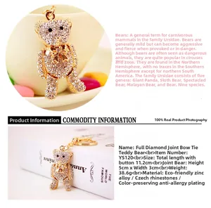 Macro view of articulated teddy bear keychain with golden alloy and Czech rhinestones