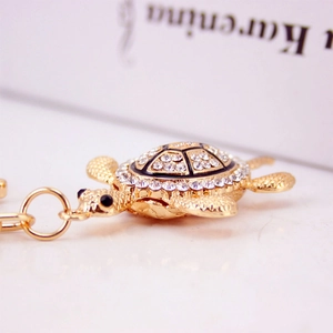 Porte-clés tortue créatif avec cristaux scintillants et finition dorée pour accessoires