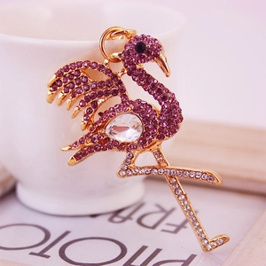 Porte-clés flamant doré avec strass violets et cristal blanc en forme de poire