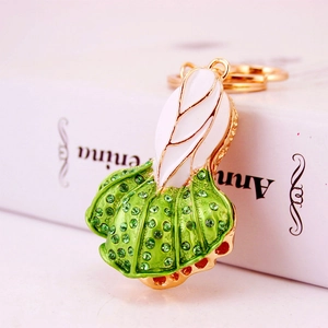 Chic rhinestone cabbage car keychain with gold metal plating and white enamel finish
