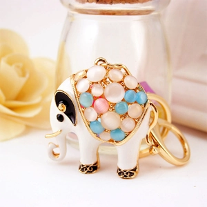 Cute opal elephant keychain with golden alloy finish and multicolored gemstone accents