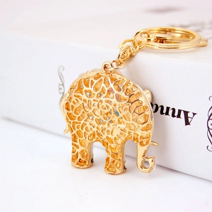 Creative golden opal elephant keychain with hollow metal design and polished key ring