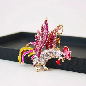 Porte-clés coq en cristal étincelant avec strass roses et finition alliage doré