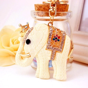 Porte-clés éléphant blanc mignon avec couronne dorée et strass colorés pour sac